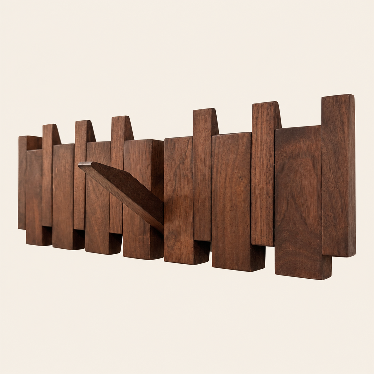 The Piano Hook in natural walnut, a second angle with one hook folded down — Wood Store NZ