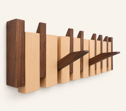 Walnut and beech Piano Hook rack from an angle, two hooks folded down — Wood Store NZ