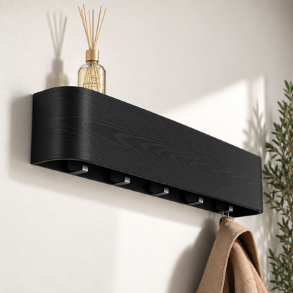 Concealed Hook Wall Coat Rack with Shelf in black finish, close angle with a reed diffuser on the shelf and a coat hanging from a hook below — Wood Store NZ