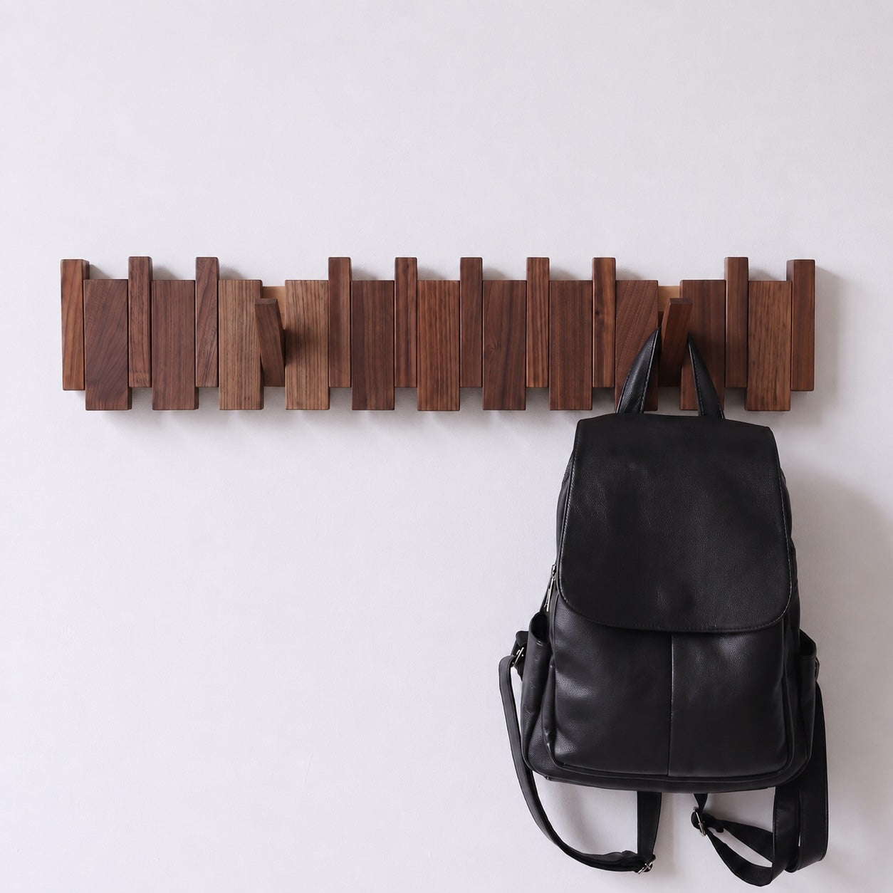 The Piano Hook folding walnut coat rack, view 3 — Wood Store NZ